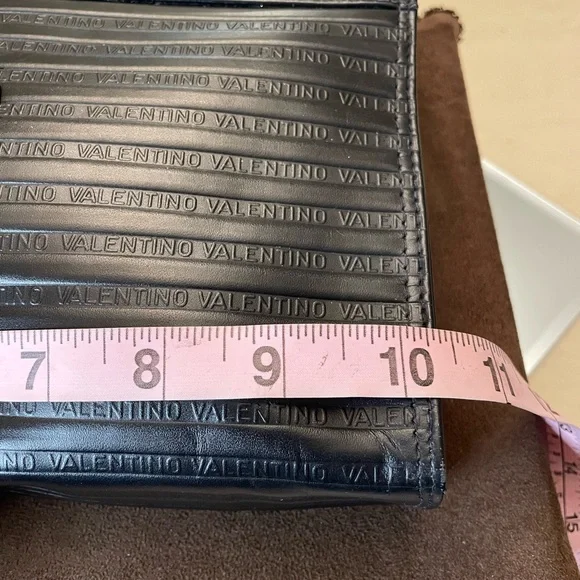 Mario Valentino Black and Gold Clutch with Elegant Wristlet